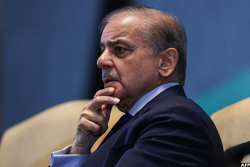 Pakistan's Prime Minister Shehbaz Sharif (pictured) on Monday said he spoke with Iran's President Masoud Pezeshkian, promising Islamabad's help bringing peace to the region. (AFP)