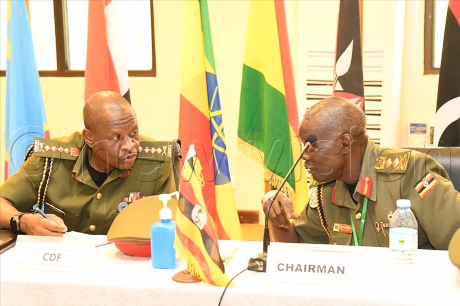 CDF Mbadi with Major Gen, George Igumba, the commandant of Uganda Staff College Kimaka and former chairperson of ACoC.