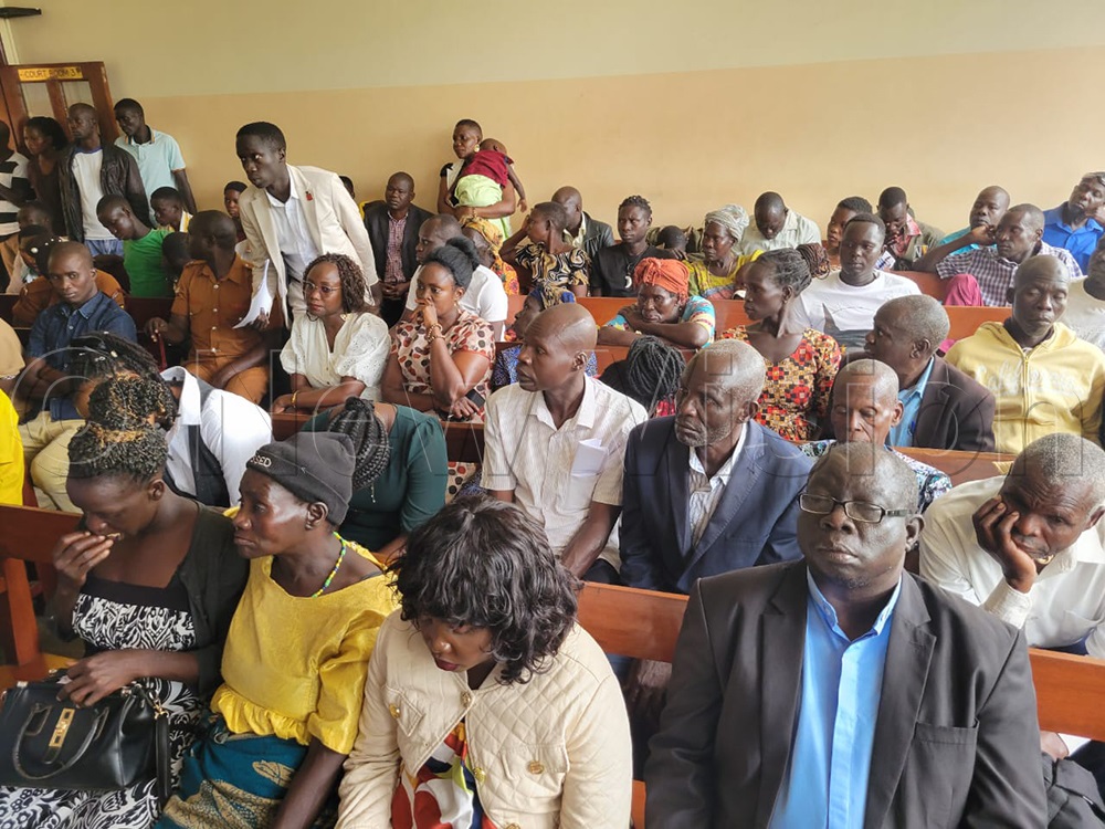 Zedriga family members seated at the courtroom. (Photo by Christopher Nyeko)