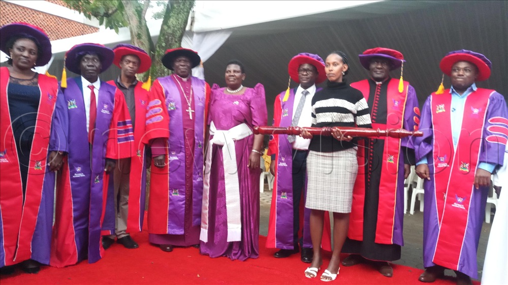 Newly installed Avance International University Chancellor Ssebaggala poses for a group photo with university top management. (Credit: Francis Emorut)