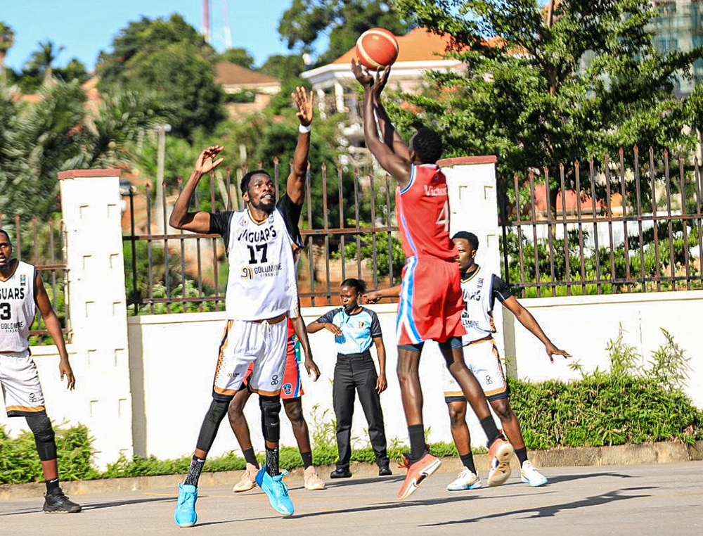 Jaguar's Peter Sifuma (no. 17) attempts to block a shot against Victoria Crocks during Saturday's encounter in Naalya. (Courtesy Photo)