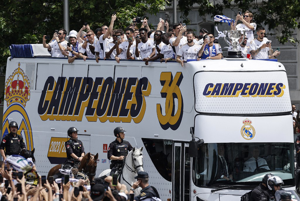 Hungry Madrid parade league title with eye on European glory