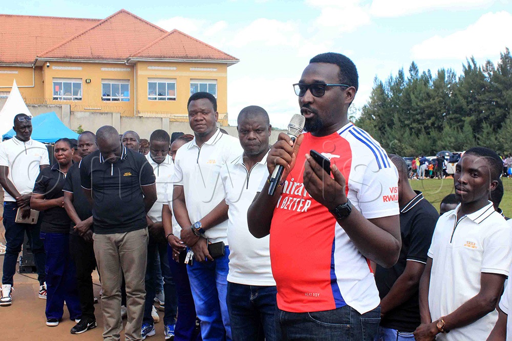  Paul Lukundo (right), representing Stephen Kiprotich, delivers his speech at the Seeta High School A-Campus inter-house competitions on Monday. (Photo by Henry Nsubuga)