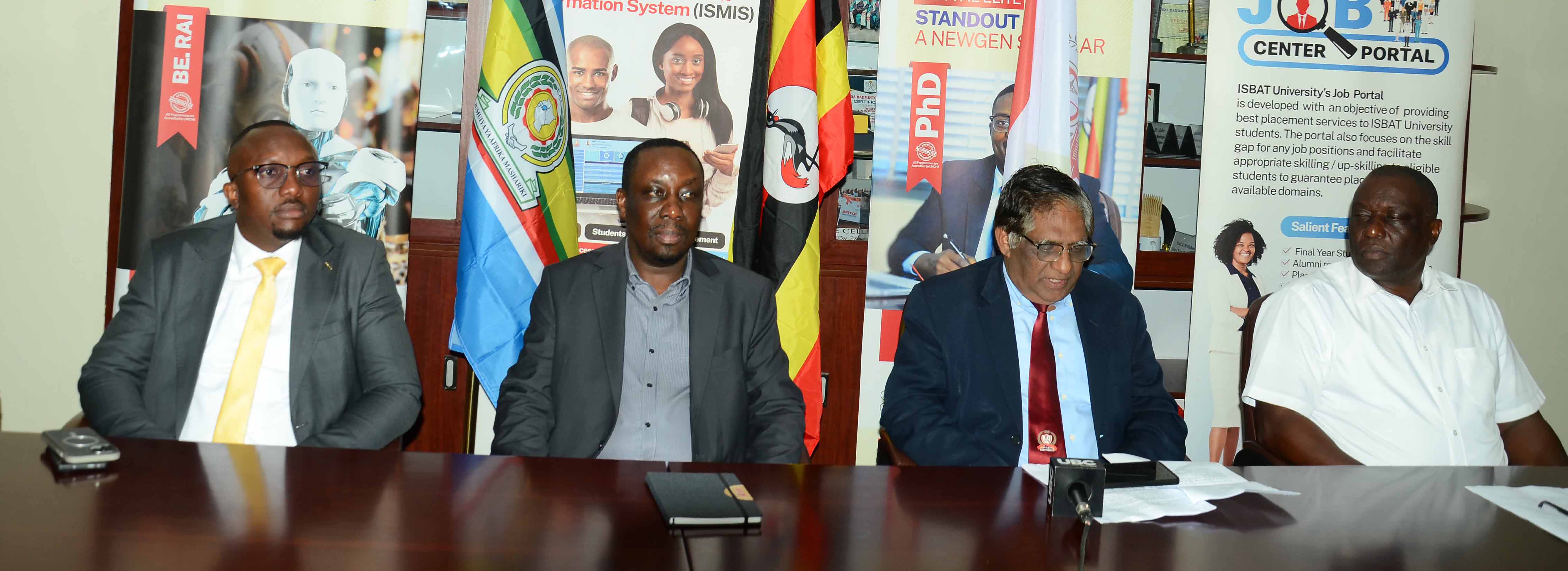 Tony Tumukunde (L), a lawyer representing ISBAT University, said an article published by one online news outlet claiming the university “could soon be evicted” from its main campus was factually incorrect.