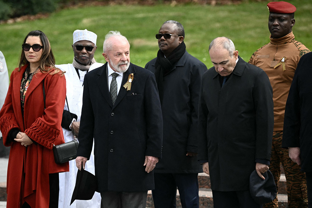 Foreign leaders, including Brazilian President Luiz Inacio Lula da Silva, Armenian Prime Minister Nikol Pasginyan and Burkina Faso's junta leader Captain Ibrahim Traore, attend a ceremony to lay flowers at the Tomb of the Unknown Soldier by the Kremlin wall in central Moscow on May 9, 2025. (Photo by AFP)