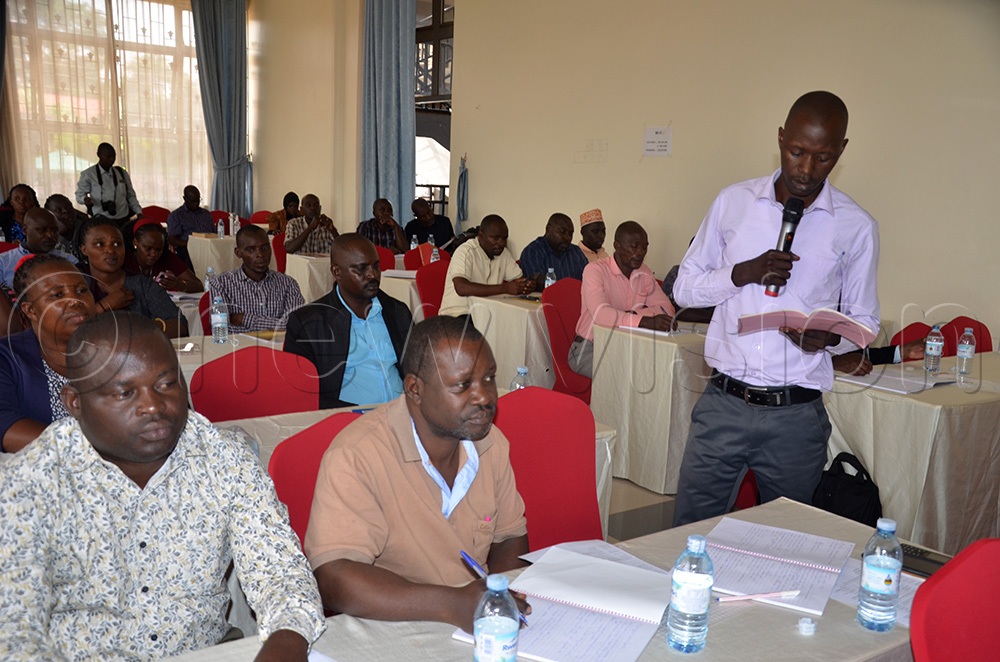 Mugisa Katusabe, one of accountants making a point during the training. (Photo by Wilson Asiimwe)