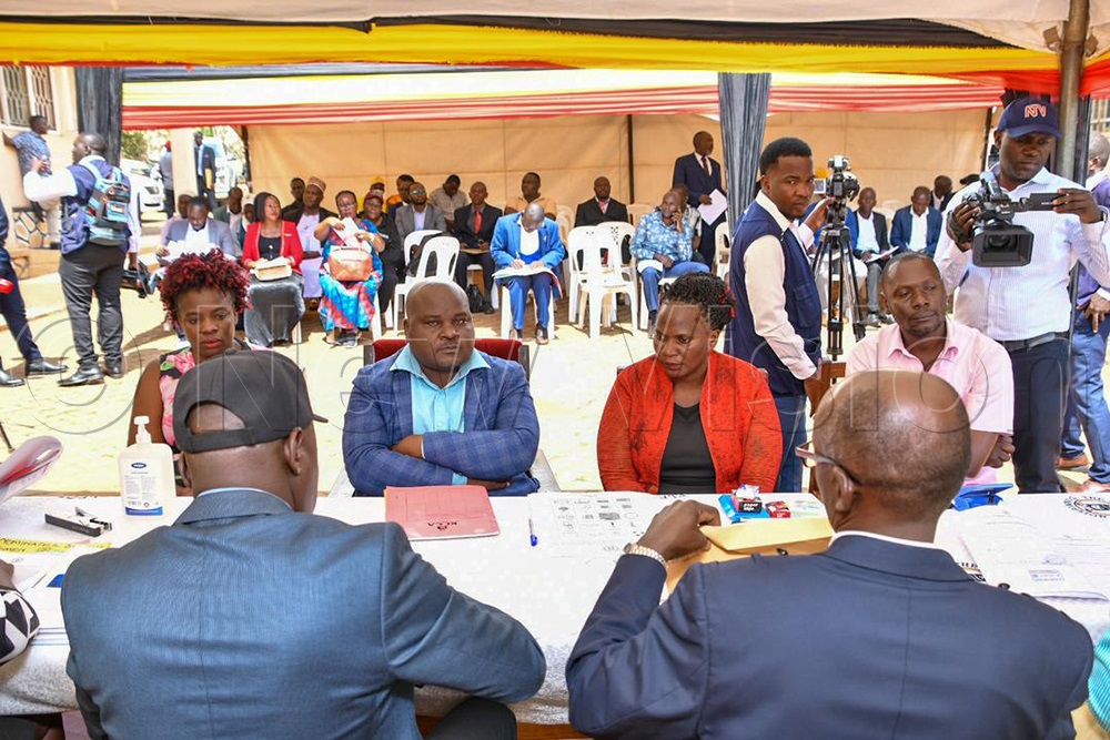 Candidates before EC officials. (Credit: Miriam Namutebi)