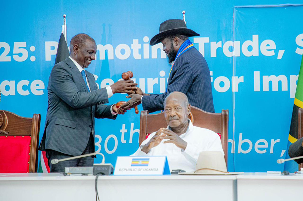South Sudan President, Kiir, handing over the instruments of power to Kenyan President Ruto. (Courtesy)