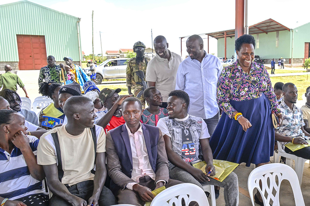 The State House Comptroller Jane Barekye, the Director of Industrial Hubs and Presidential Projects at State House Eng. Raymond Kamugisha, the Private Secretary In Charge of Political Affairs and the Youth at State House Godfrey Longa having a moment with SACCO leaders from Regional President Industrial Hubs of Sebei, Teso and Karamoja. (Photo by PPU/Tony Rujuta)