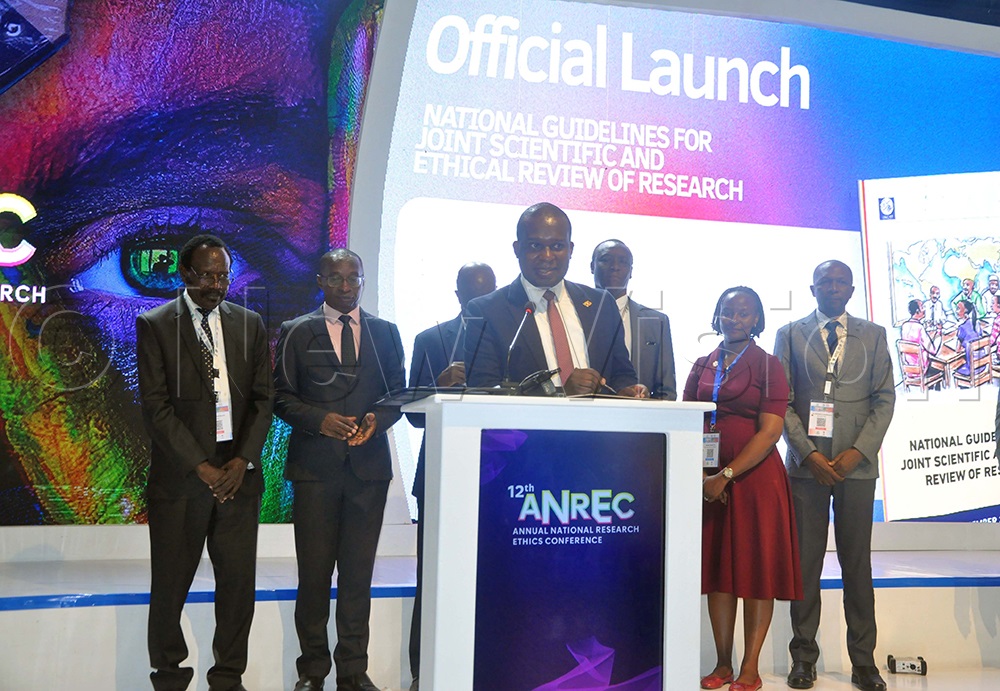 Dr Cosmas Mwikiriza, superintendent industrial value chains from the ministry of science and technology, representing minister for science, technology and innovation, Dr Monica Musenero, during the opening and launch of research guidelines at the 12th Annual National Research Ethics Conference at Hotel Africana. (Photo by John Odyek)