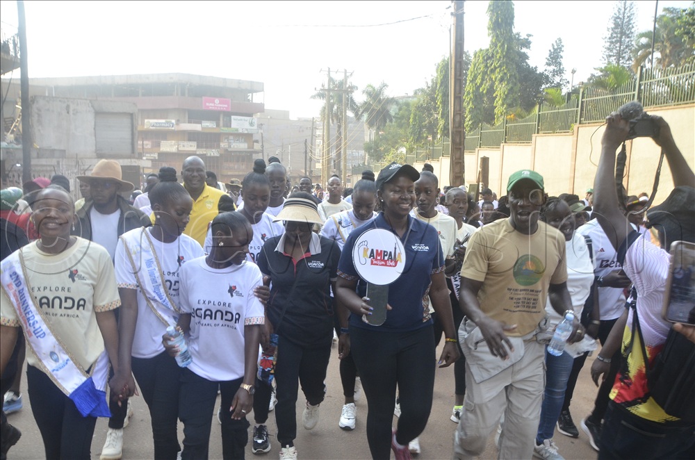 Minister Nakawuki leading the participants in the walk