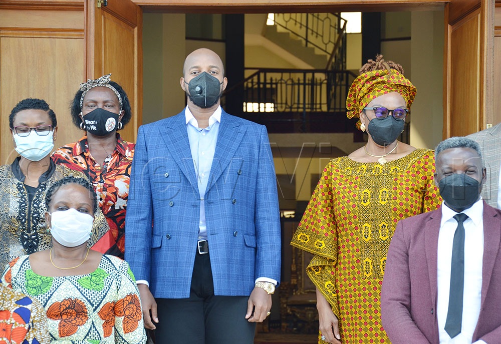 King Oyo with AIDS Development Partners. (Credit: Agnes Kyotalengerire)