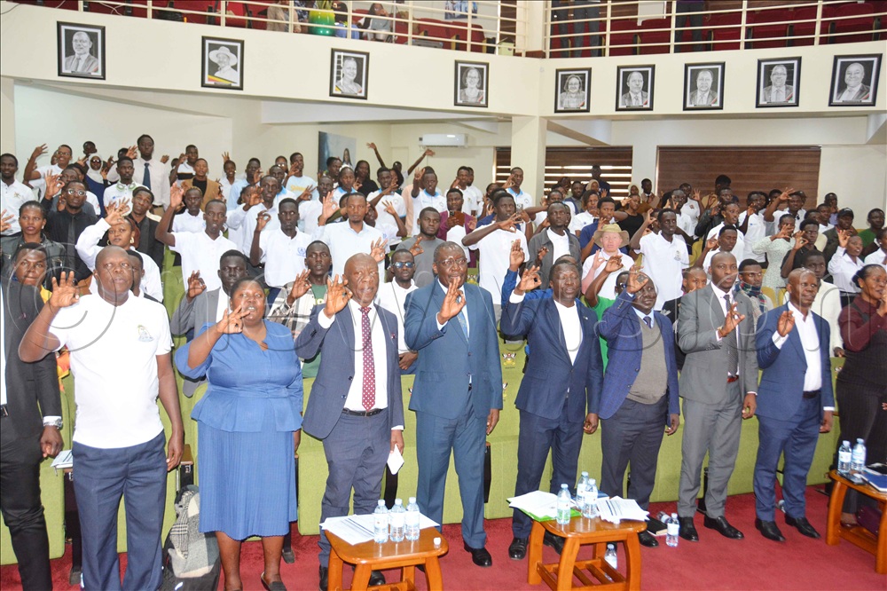 Front row: The commissioner at the Ministry of Education, Michael Wanyama (fourth left) with the coordinator UNESCO regional office for East Africa, Charles Draecabo (fifth left), assistant commissioner John Ochira (fourth right) pose for a photograph with university students during the National Inter-University Debate Competition 2026 Grand Final at Makerere University in Kampala on Wednesday Sept 29, 206.