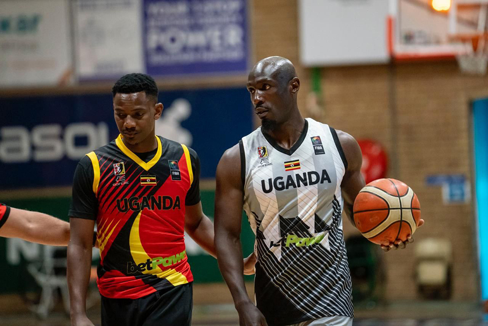 Ivan Muhwezi (left) and Silverbacks captain Robinson Opong during the training camp. (Courtesy Photo/FUBA)
