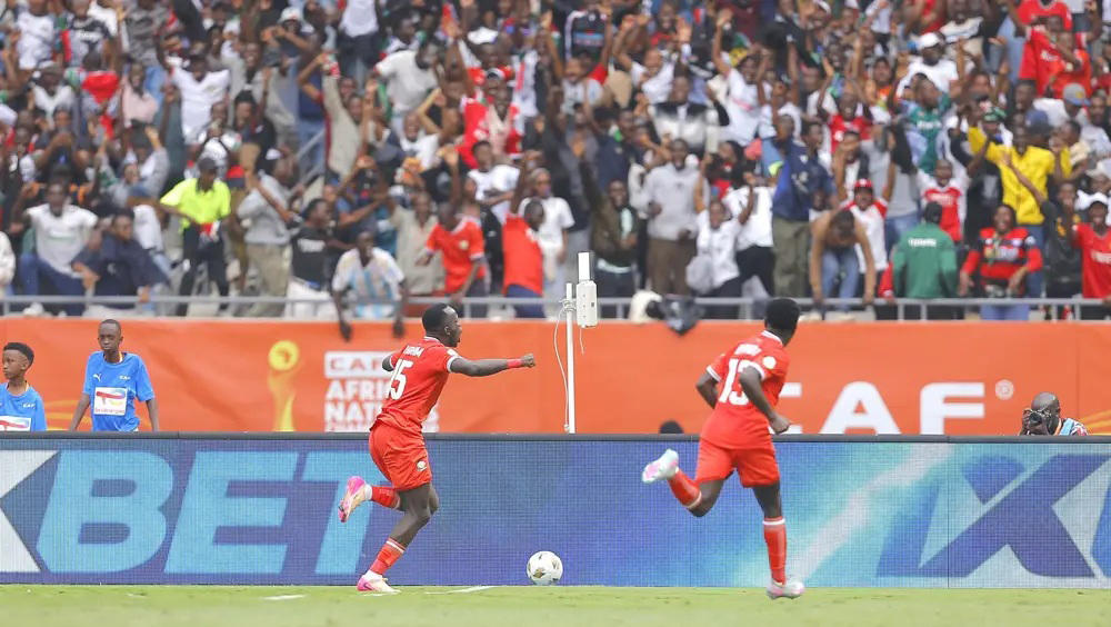 Ryan Ogam of Kenya celebrates after scoring during the 2024 African Nations Championship (CHAN) football match between Kenya and Morocco. (Courtesy Photo/CAF)