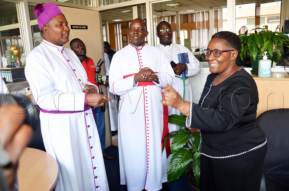 Mukono diocese Bishop Rt. Rev. Enos Kitto Kagodo meeting Vision Group Editor-in-Chief Barbara Kaija in her office. (Photo by Isaac Nuwagaba)