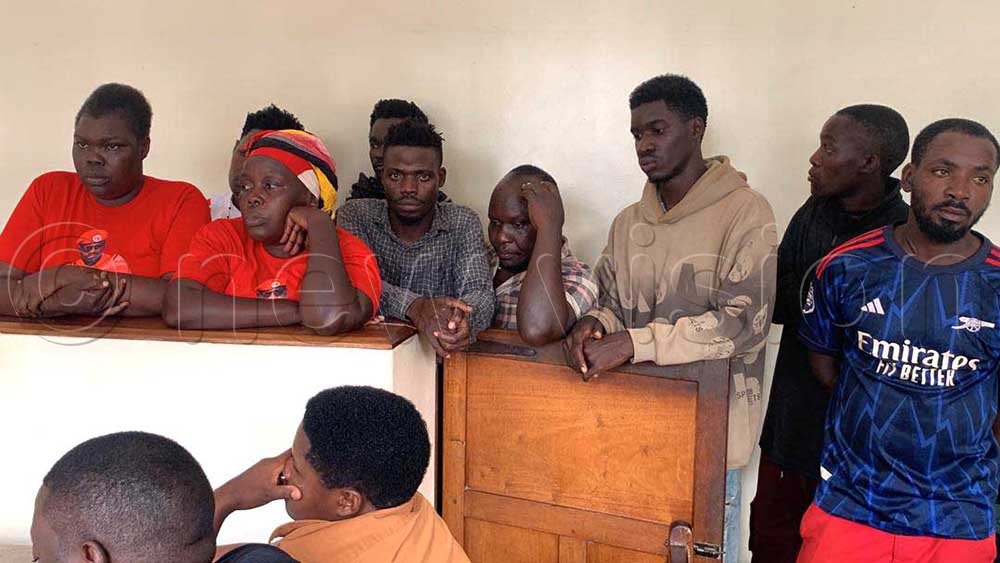 NUP supporters in the dock charged with malicious damage to property and robbery. They were remanded to Lira Main Prison till November 12, when they will reappear in court. (Credit: Hudson Apunyo)
