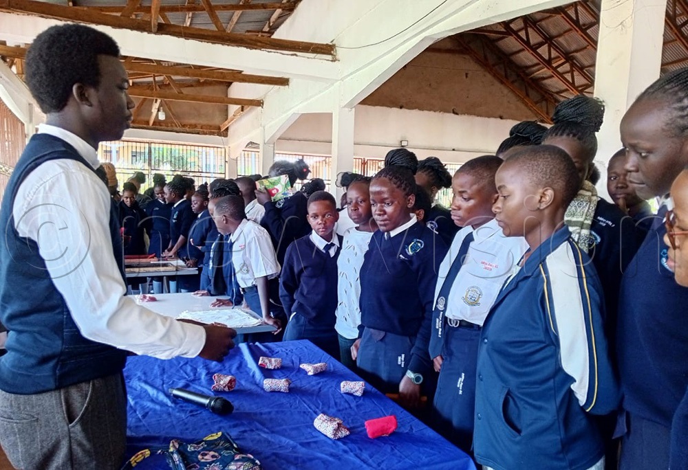 Students of St. Lawrence Citizens High School Horizon Campus in Kyengera participate in art to promote menstrual health. (Photo by Nelson Kiva)