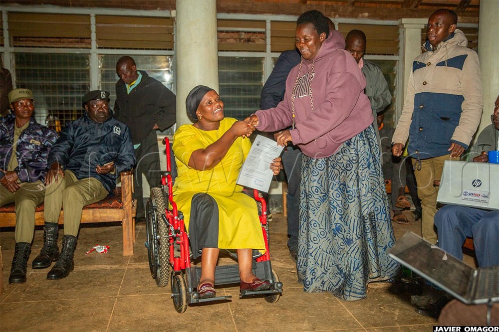 Cheptoek being congratulated by her challenger Susan Chemutai.
