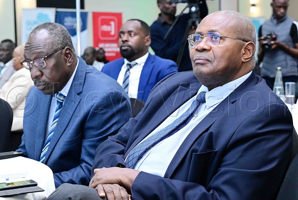 Former Solicitor General Francis Atoke (left) and the principal Judge emeritus, Yorokamu Bamwine (right), attending GUMZO LA ADR conference at Mestil hotel and residences in Kampala on Monday, March 9, 2026. (Photo by Mpalanyi Ssentongo)