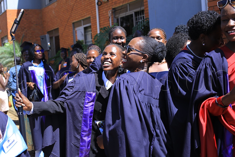 Graduates celebrating during the graduation ceremony at Luigi Giussani Institute of Higher Education. (Credit: Derrick Muduku)