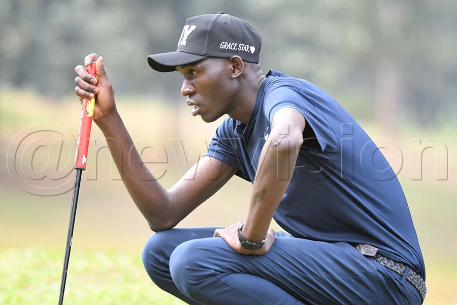 Grace Kasango focuses on the line of his putt during the Absa Chairman's Bell tournament at Kitante, July 18, 2026. Photo by Michael Nsubuga