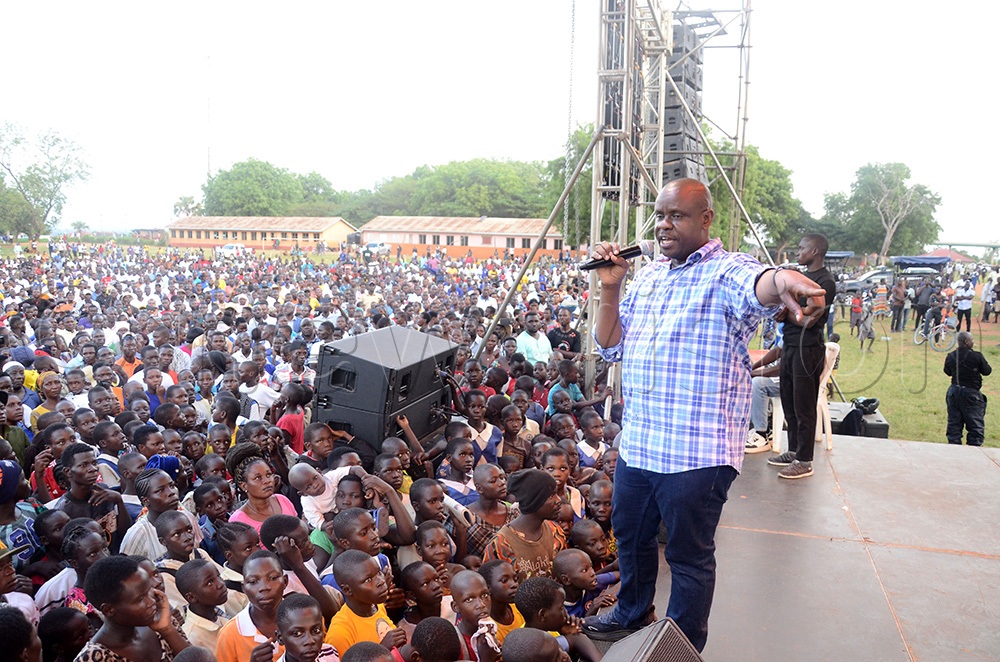 Balaam Barugahara, the Minister of Local Government, addressing residents of Pakwach District during an anti-corruption rally dubbed Expose the Corrupt at St. Mary’s Primary School, Omach on August 13, 2026. (Photo by Lawrence Mulondo)
