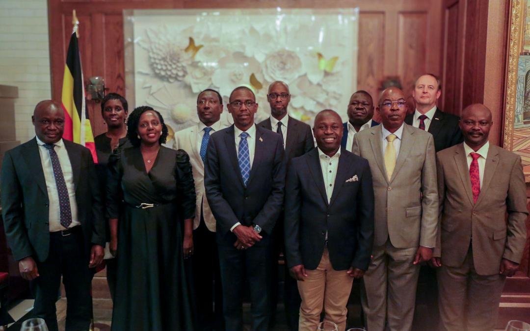 The Minister of Defence and Veteran Affairs, Hon. Kiryowa Kiwanuka, posing for a photo with the Uganda delegation. (Courtesy)