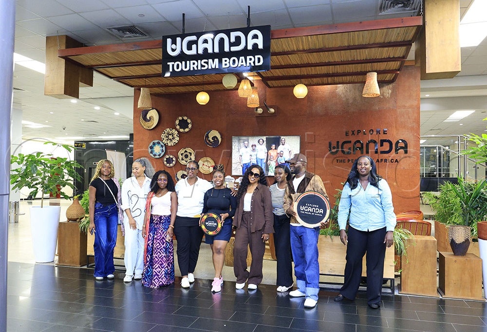 A group of wedding and events planners arrives at Entebbe International Airport ahead of their conference at Speke Resort Convention Centre. (Credit: Julius Luwemba)