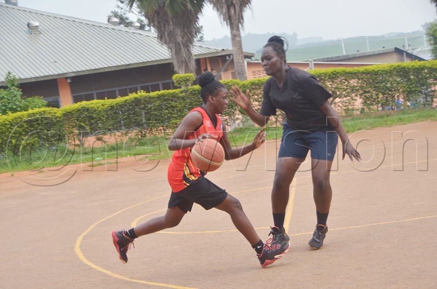Basketball 3x3 players Maria Nanyonjo(Red) and Ruth Kihumuro during a training session