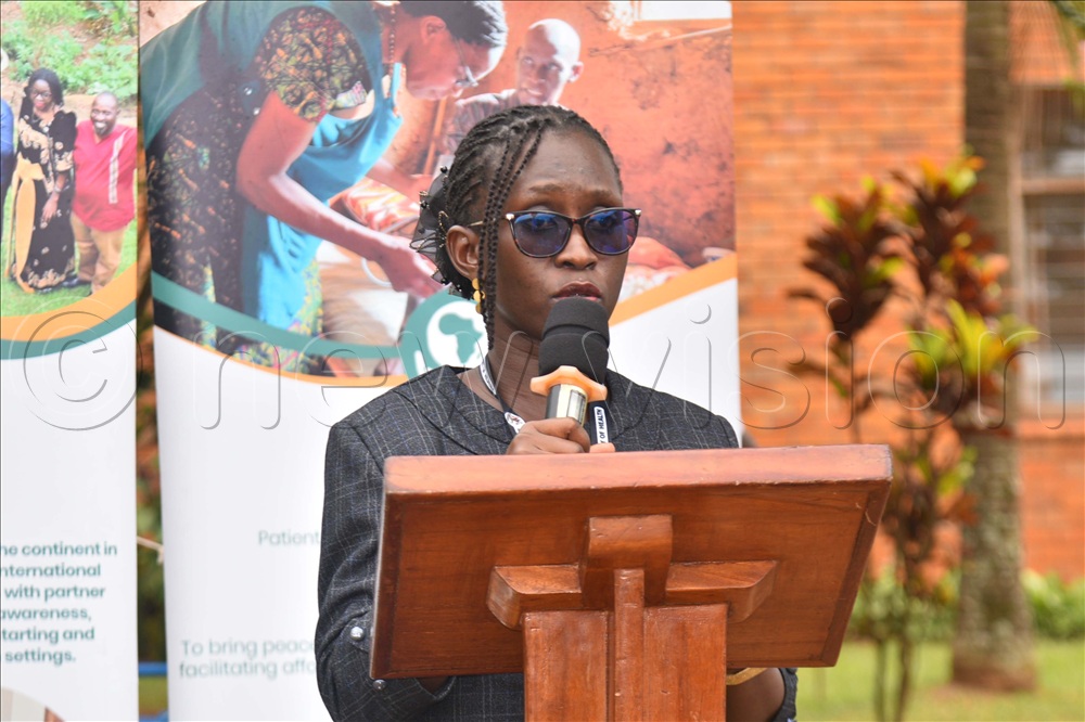 Dr Miriam Ajambo, the Vice Chairperson of the Palliative Care Association of Uganda (PCAU) and Acting Head of the Palliative Care Division at the Ministry of Health making her remarks.