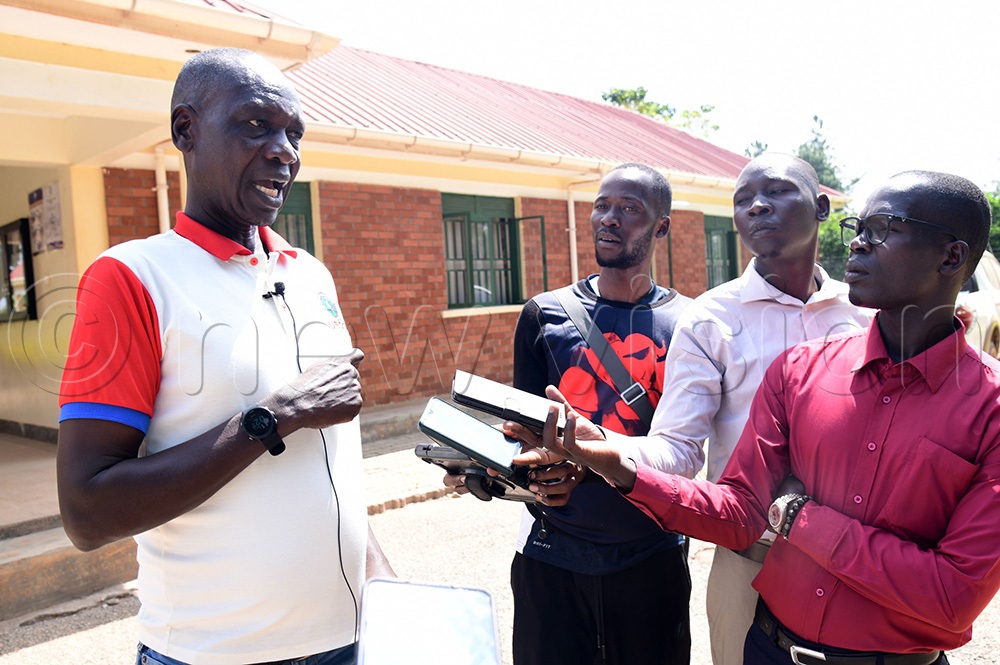 UEDCL communications manager Stephen Ilungole speaking to the media after the ruling. (Photo by Godfrey Ojore)