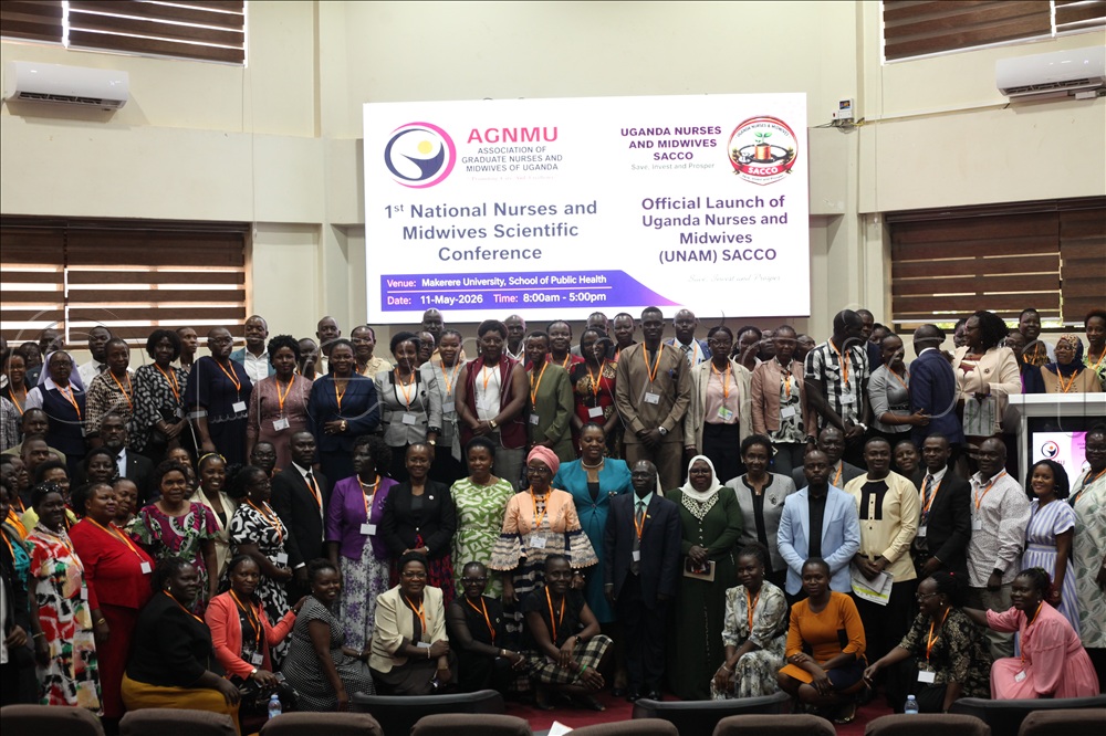 Nurses and midwives pose for a group photo at Makerere Univerity School of public health hall on May 11 for their annual conference.
