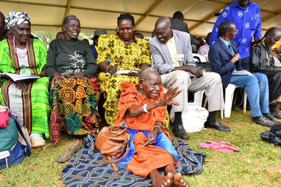 Happy 112-year-old Peruth Kyazike (seated front) as she attended the celebrations to mark International Day of Older Persons.