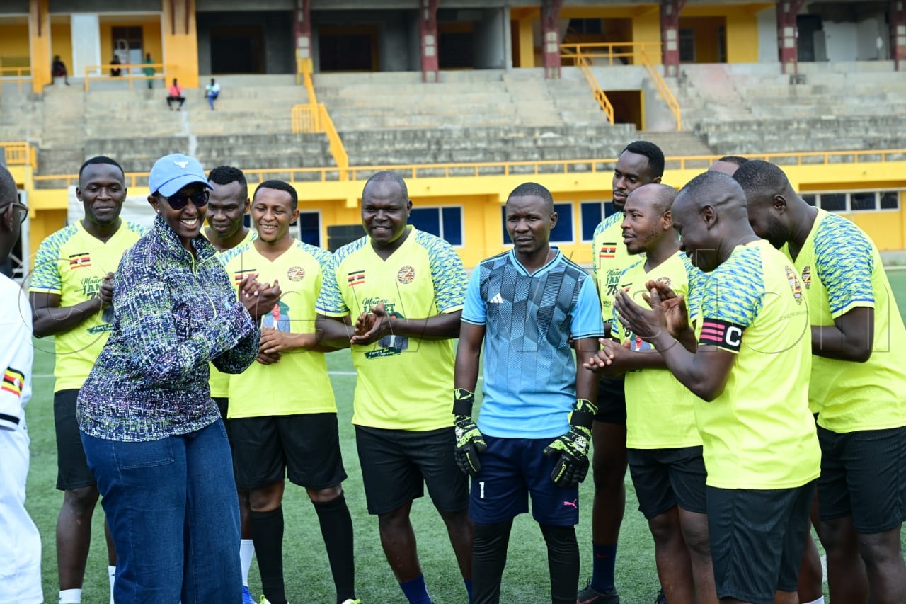 Brig. Charity Bainababo shares a moment with State Minister for Sports Peter Ogwang and other footballers during the Mama at 78 Legacy Festival at MTN Omondi Stadium, Lugogo. (Credit: Eddie Ssejjoba)