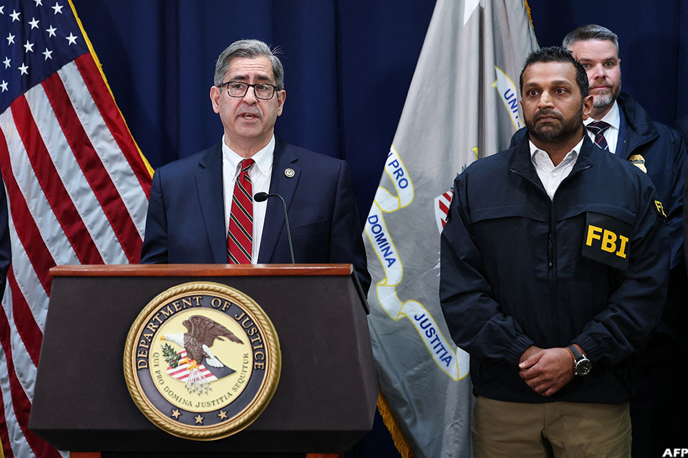 US Attorney for the Eastern District of New York Joseph Nocella (L) speaks alongside FBI Director Kash Patel (R) during a news conference to announce arrests tied to illegal sports betting and poker game schemes, in New York City on October 23, 2025