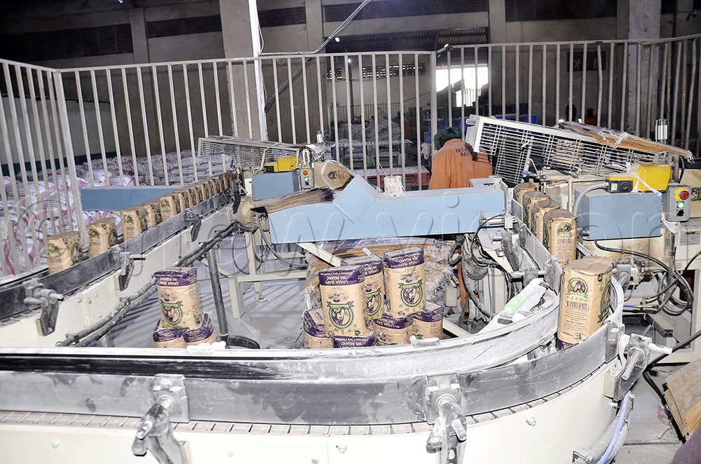 The packing machinery in the flour milling section at Ntake Group in Nalukolongo Lubaga Division, Kampala. (Photo by Ronnie Kijjambu)