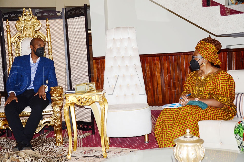 King Oyo in conversation with the UN WOMEN deputy director Adekemi Ndieli, (Credit: Agnes Kyotalengerire)