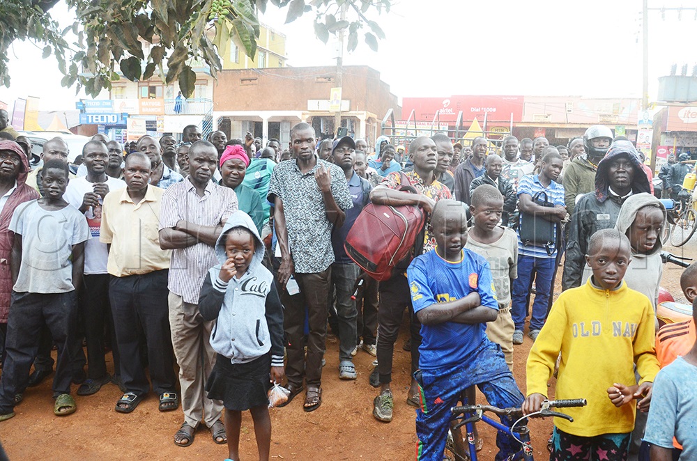 Residents listening to Muntu during the campaign rally. (Credit: Isaac Nuwagaba)