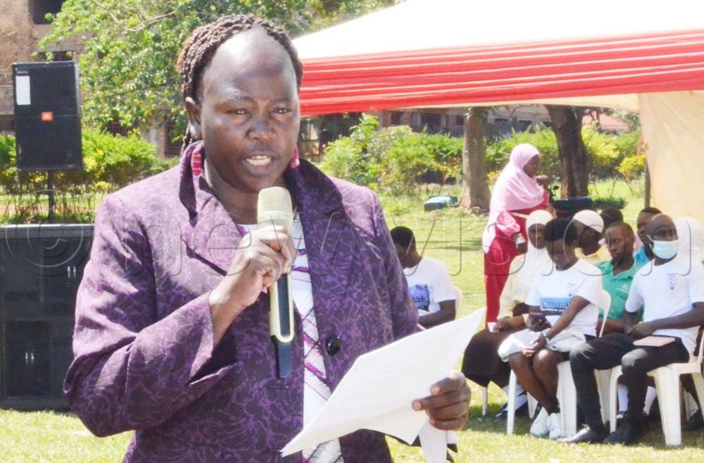 Lucy Otto, the assistant commissioner Family Affairs Ministry of Gender, Labour and Social Development, speaking during the launch of the campaign on the Protection from Sexual Exploitation, Abuse and Harassment (PSEAH) in Buikwe. (Credit: Violet Nabatanzi)