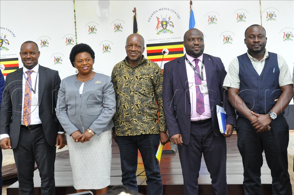 (L-R) Andrew Nyumba Secretary Uganda Land Commission, Harriet Ntabazi State Minister for lands, Tom John Fisher Kasenge Commissioner Uganda Land Commission, Denis Musinguzi Principal land officer Uganda Land Commission and Henry Opyene Communication officer Ministry of lands pose for a group photo after addressing journalists at the Uganda Media Centre on July 3, 2026. 