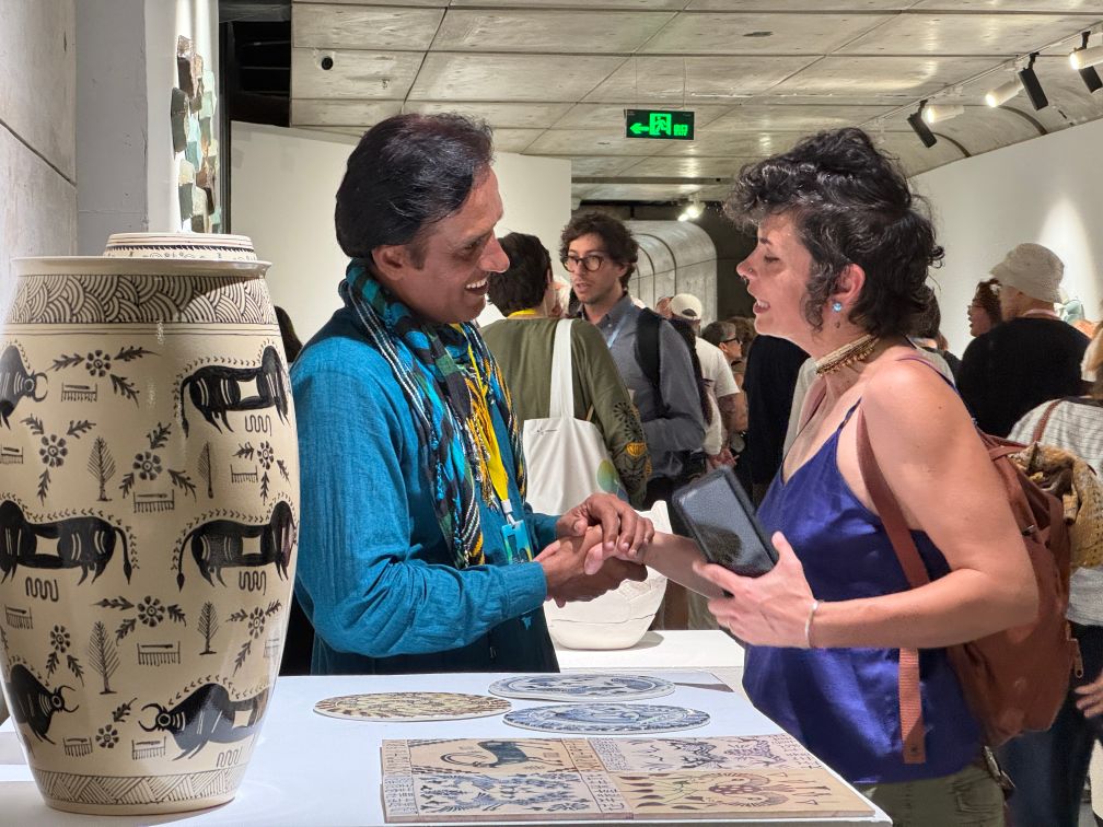 Foreign artists are seen during the 2026 Congress of the International Academy of Ceramics in Jingdezhen, east China's Jiangxi Province.