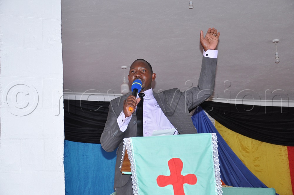 Pastor Joshua Byabasaija Amooti while preaching to Christians recently. (Credit: Peter Abaanabasazi)