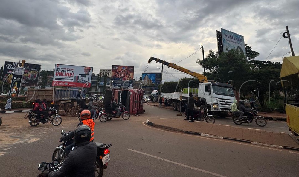 By about 6am, a rescue team and Uganda Police Force was already on the scene clearing the debris and removing the truck. (Credit: Gerald Tenywa)