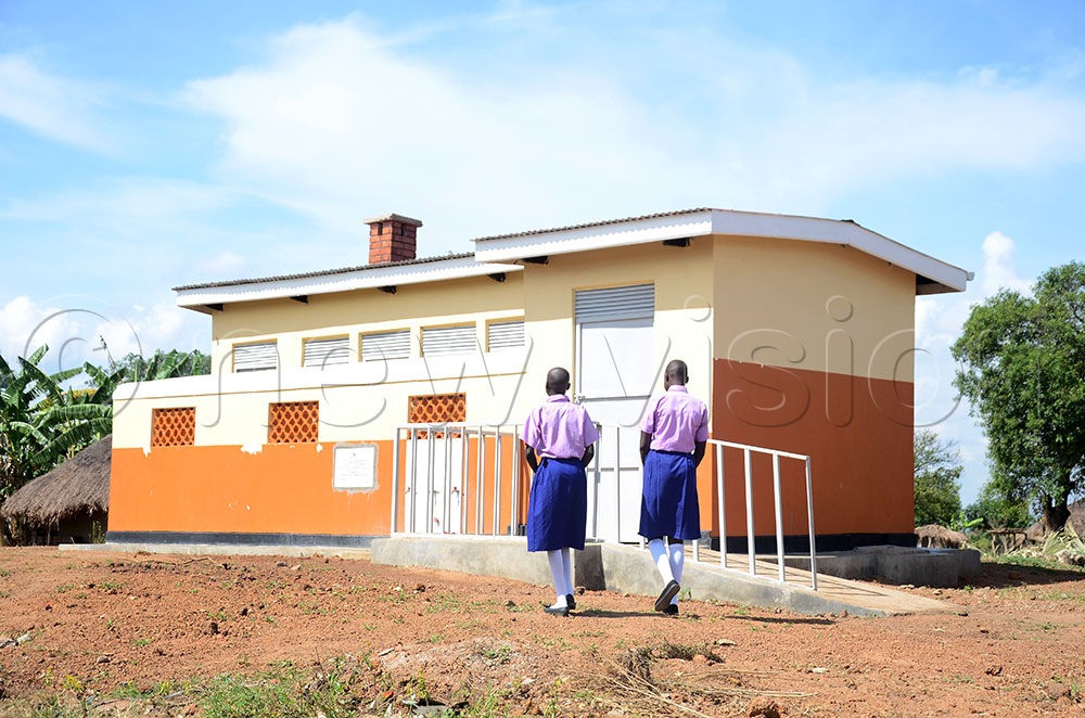 Pupils of Odum Primary School in Puranga sub county Pader district moving to their improved latrine that was installed in their school under the One Health Project. (Credit: Lawrence Mulondo)