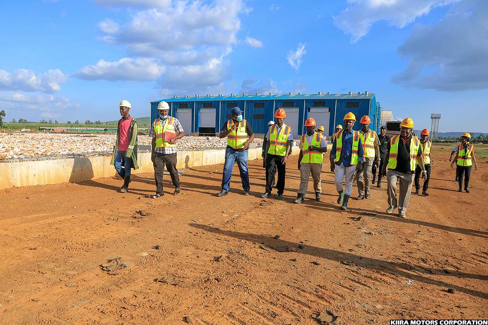 Deputy Speaker of Parliament Thomas Tayebwa (front 2R) on a guided tour of the KMC plant