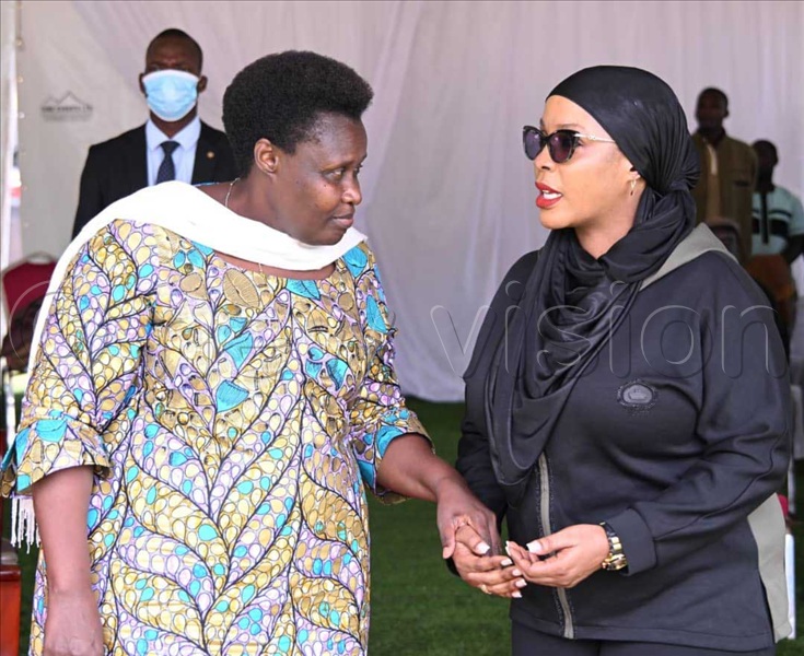 The Vice President, Jessica Alupo (L), chatting with Hajati Amina Mukalazi, the head of the State House Local Content Unit. after flagging off the distribution of coffee seedlings to farmers and launching of the National Coffee Farmers Empowerment Program (NCFEP) at Muhanga in Rukiga district, April 01,2026.