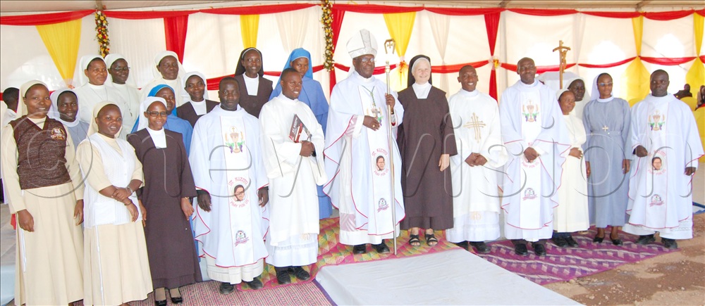 Bishop Joseph Antony Zziwa (wearing a mitre) shares a photo-moment with some of the religious men and women who graced the celebration of the 25th anniversary of Kyengeza parish. 
