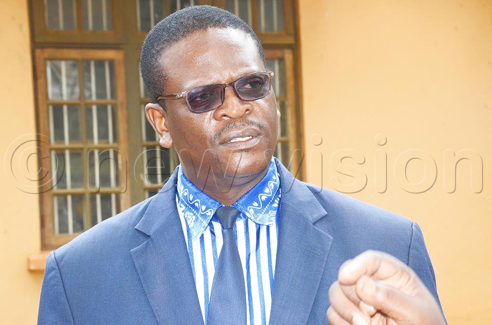 The PFF deputy president in charge of Buganda and the Buikwe South Member of Parliament, Micheal Bayigga Lulume addressing a press conference at PFF office in Nakasero Kampala on Friday. (Credit: Isaac Nuwagaba)