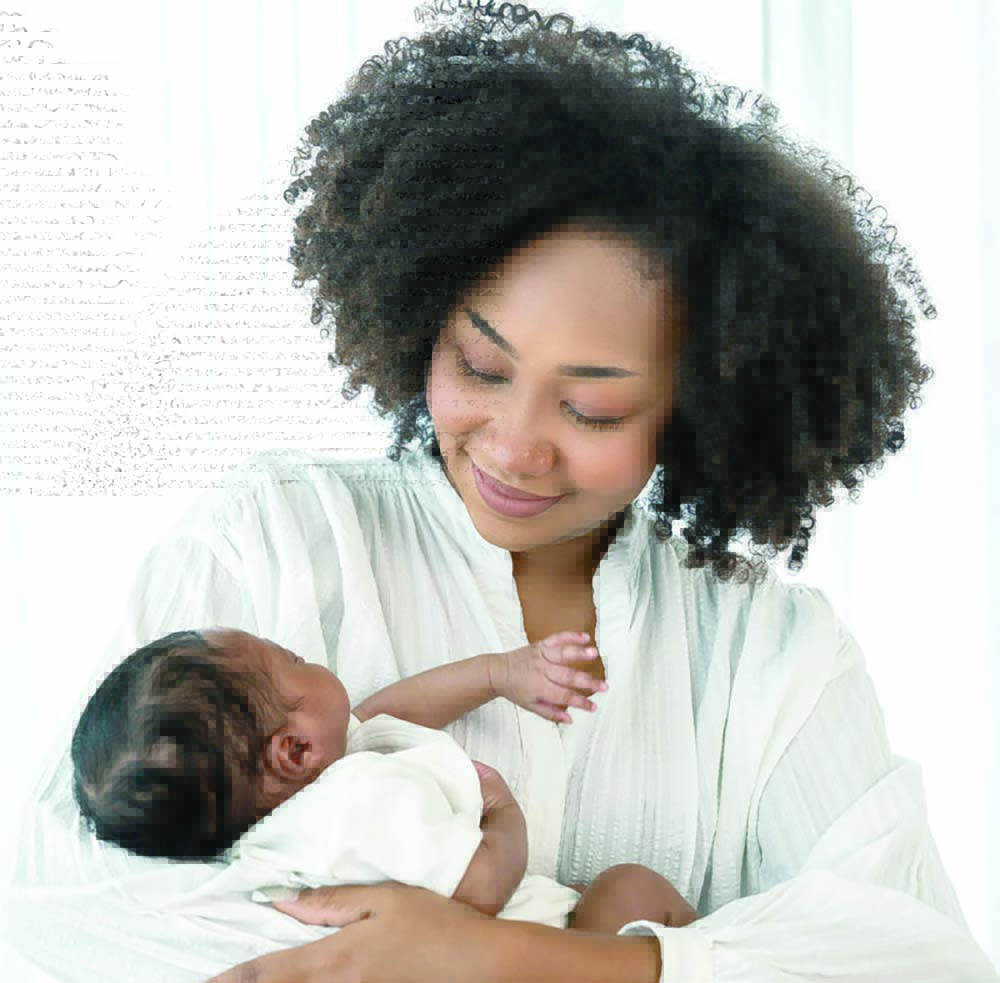 A mother caring for her baby. Nyantozi locals have pledged to be more involved.